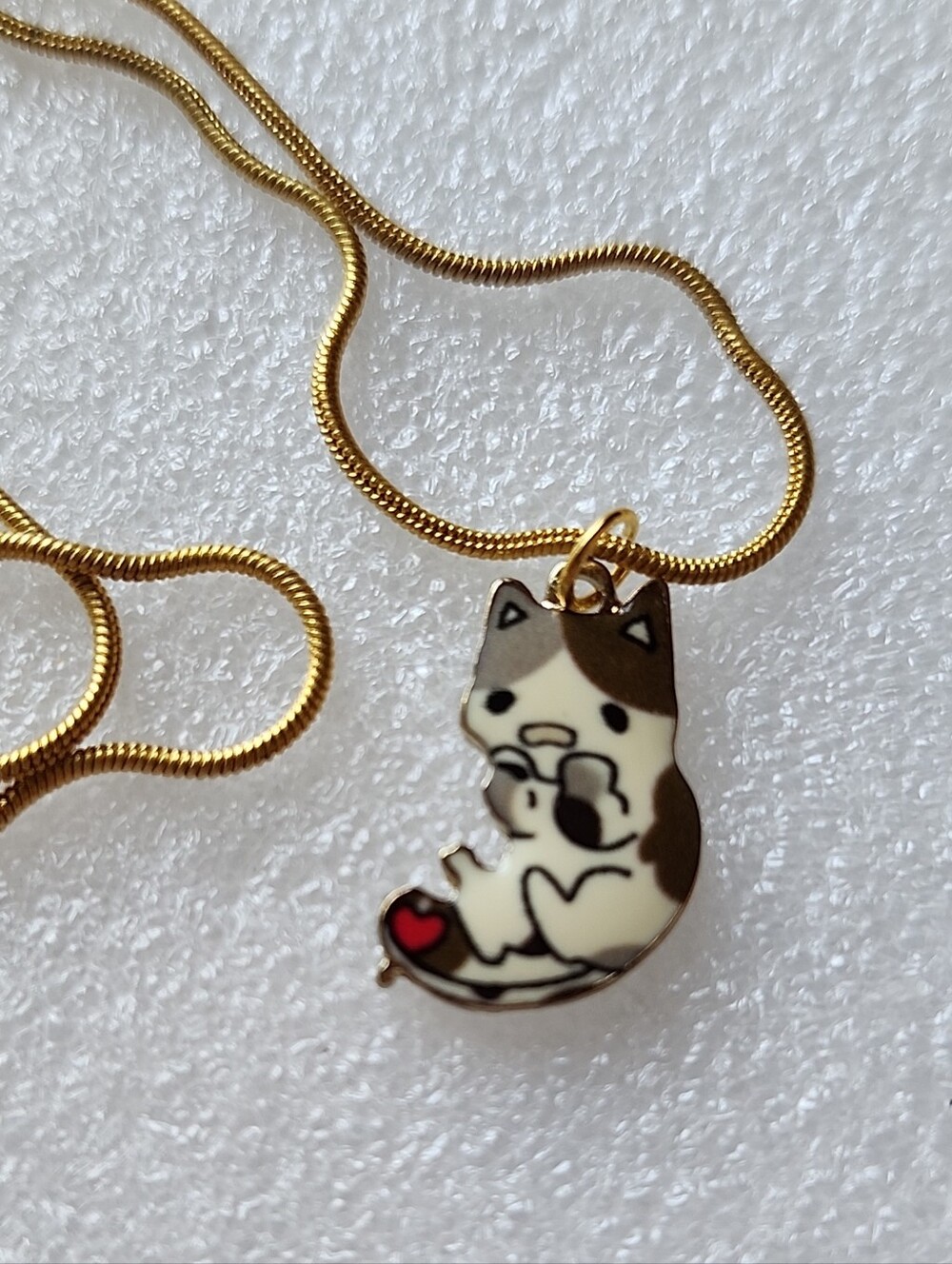 Hand Crafted Gold Necklace with White, Brown and Red Cat Pendant